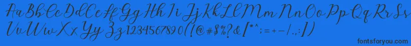 Emeley Script Font – Black Fonts on Blue Background