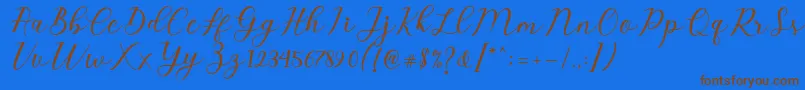 Emeley Script Font – Brown Fonts on Blue Background
