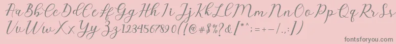 フォントEmeley Script – ピンクの背景に灰色の文字