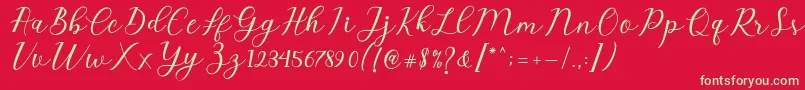 Emeley Script Font – Green Fonts on Red Background