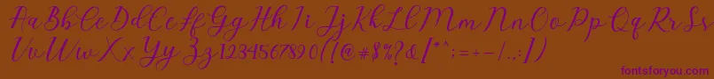 Czcionka Emeley Script – fioletowe czcionki na brązowym tle