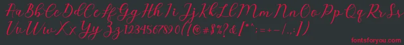 Emeley Script Font – Red Fonts on Black Background