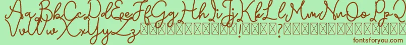 Emerttons Font – Brown Fonts on Green Background