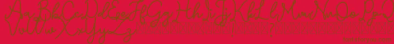 Emerttons Font – Brown Fonts on Red Background