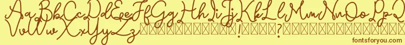 Emerttons Font – Brown Fonts on Yellow Background