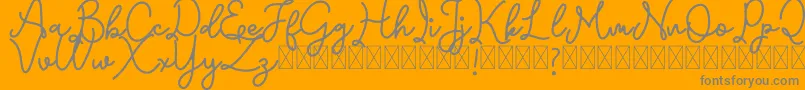 Emerttons-Schriftart – Graue Schriften auf orangefarbenem Hintergrund