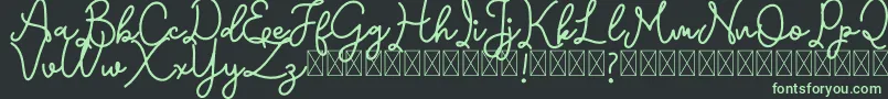 Emerttons Font – Green Fonts on Black Background