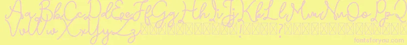 Emerttons Font – Pink Fonts on Yellow Background