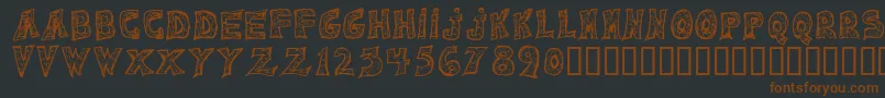 Emilie Regular-fontti – ruskeat fontit mustalla taustalla