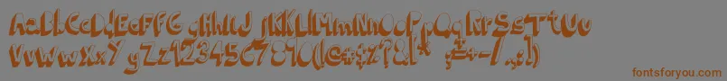 フォントIndietronicaBold – 茶色の文字が灰色の背景にあります。