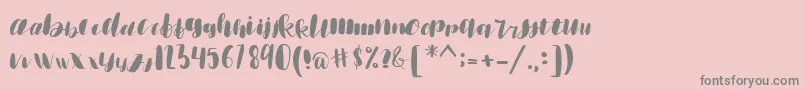 emisha Font – Gray Fonts on Pink Background