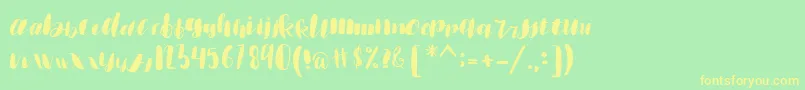 emisha Font – Yellow Fonts on Green Background