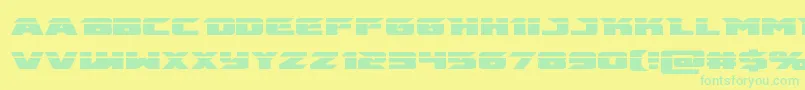 emissarylaser-Schriftart – Grüne Schriften auf gelbem Hintergrund