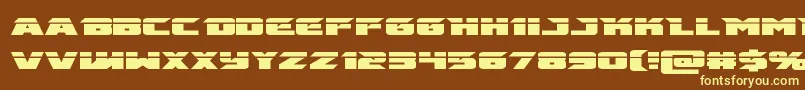 emissarylaser-fontti – keltaiset fontit ruskealla taustalla