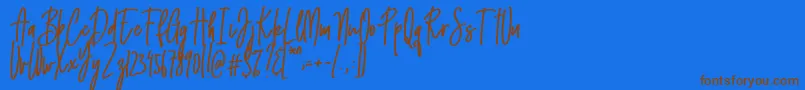 Emma signature Font – Brown Fonts on Blue Background