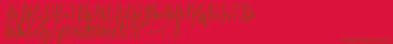 Emma signature Font – Brown Fonts on Red Background