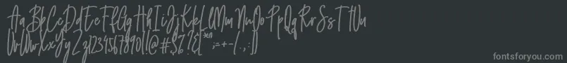 フォントEmma signature – 黒い背景に灰色の文字