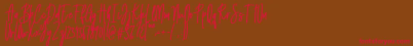 Emma signature-Schriftart – Rote Schriften auf braunem Hintergrund