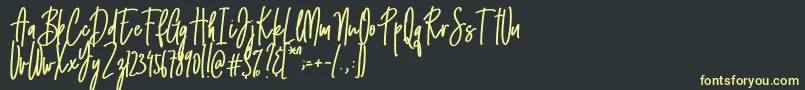 Emma signature Font – Yellow Fonts on Black Background