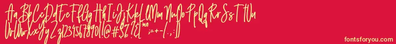 Fonte Emma signature – fontes amarelas em um fundo vermelho
