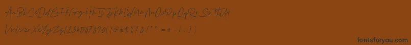 Fonte Emmaverp – fontes pretas em um fundo marrom