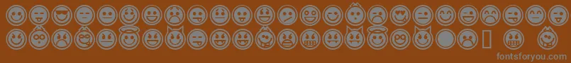 Czcionka emoticons outline – szare czcionki na brązowym tle