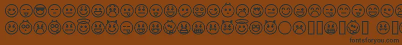 Fonte emoticons – fontes pretas em um fundo marrom