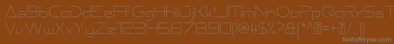 Emporium Thin-Schriftart – Graue Schriften auf braunem Hintergrund