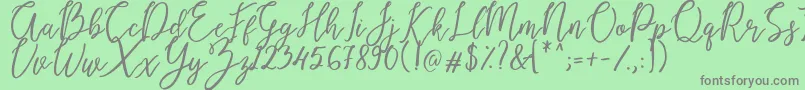 Endestry-fontti – harmaat kirjasimet vihreällä taustalla