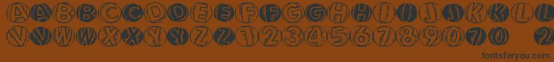 Linocapsar Font – Black Fonts on Brown Background