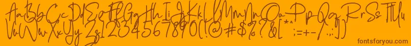 Fonte Enthusiast Behavior   – fontes marrons em um fundo laranja