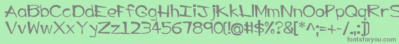 フォントEP Big Guy – 緑の背景に灰色の文字