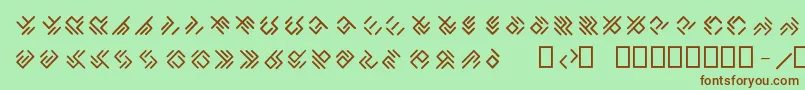 Czcionka EPTA GLYPHS  – brązowe czcionki na zielonym tle