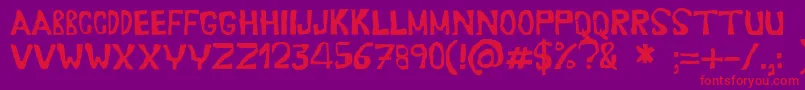 Erasaur Font – Red Fonts on Purple Background