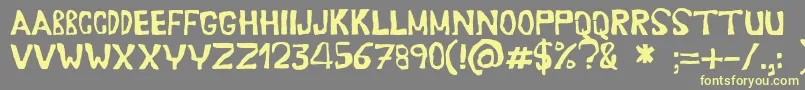 Erasaur Font – Yellow Fonts on Gray Background