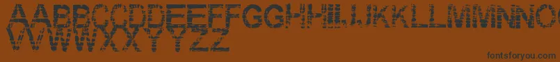 Eraser Font – Black Fonts on Brown Background