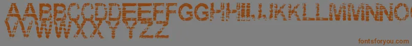 Eraser Font – Brown Fonts on Gray Background