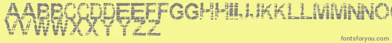 Eraser Font – Gray Fonts on Yellow Background