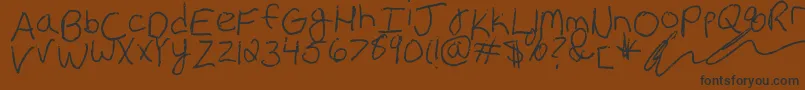 Erin s Handwriting Font – Black Fonts on Brown Background