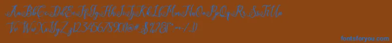 Eritta Script Font – Blue Fonts on Brown Background