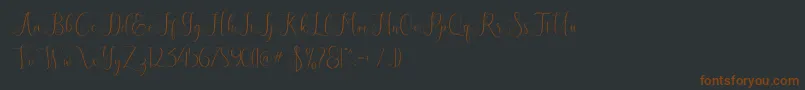 Eritta Font – Brown Fonts on Black Background