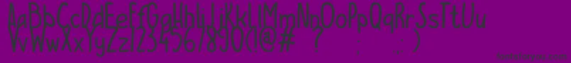 フォントESCAMPURENAK – 紫の背景に黒い文字