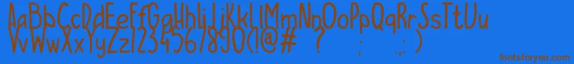 ESCAMPURENAK Font – Brown Fonts on Blue Background