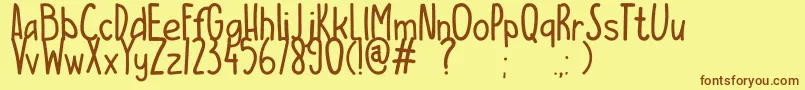 Weitere Informationen zur ESCAMPURENAK-Schriftart ESCAMPURENAK-Schriftart – Braune Schriften auf gelbem Hintergrund