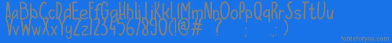 ESCAMPURENAK Font – Gray Fonts on Blue Background