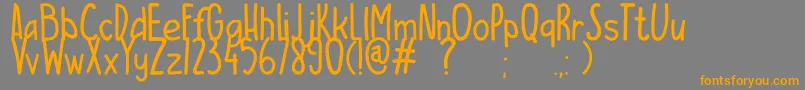 ESCAMPURENAK Font – Orange Fonts on Gray Background