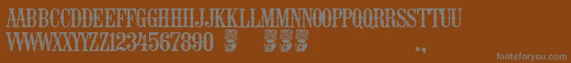EspaРґa Font – Gray Fonts on Brown Background