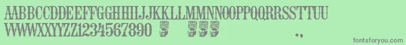 EspaРґa Font – Gray Fonts on Green Background