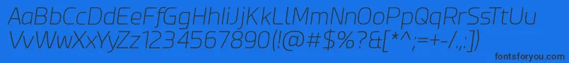 Fonte Esphimere Extra Light Italic – fontes pretas em um fundo azul