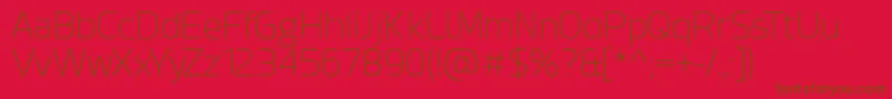 Esphimere Extra Light-Schriftart – Braune Schriften auf rotem Hintergrund